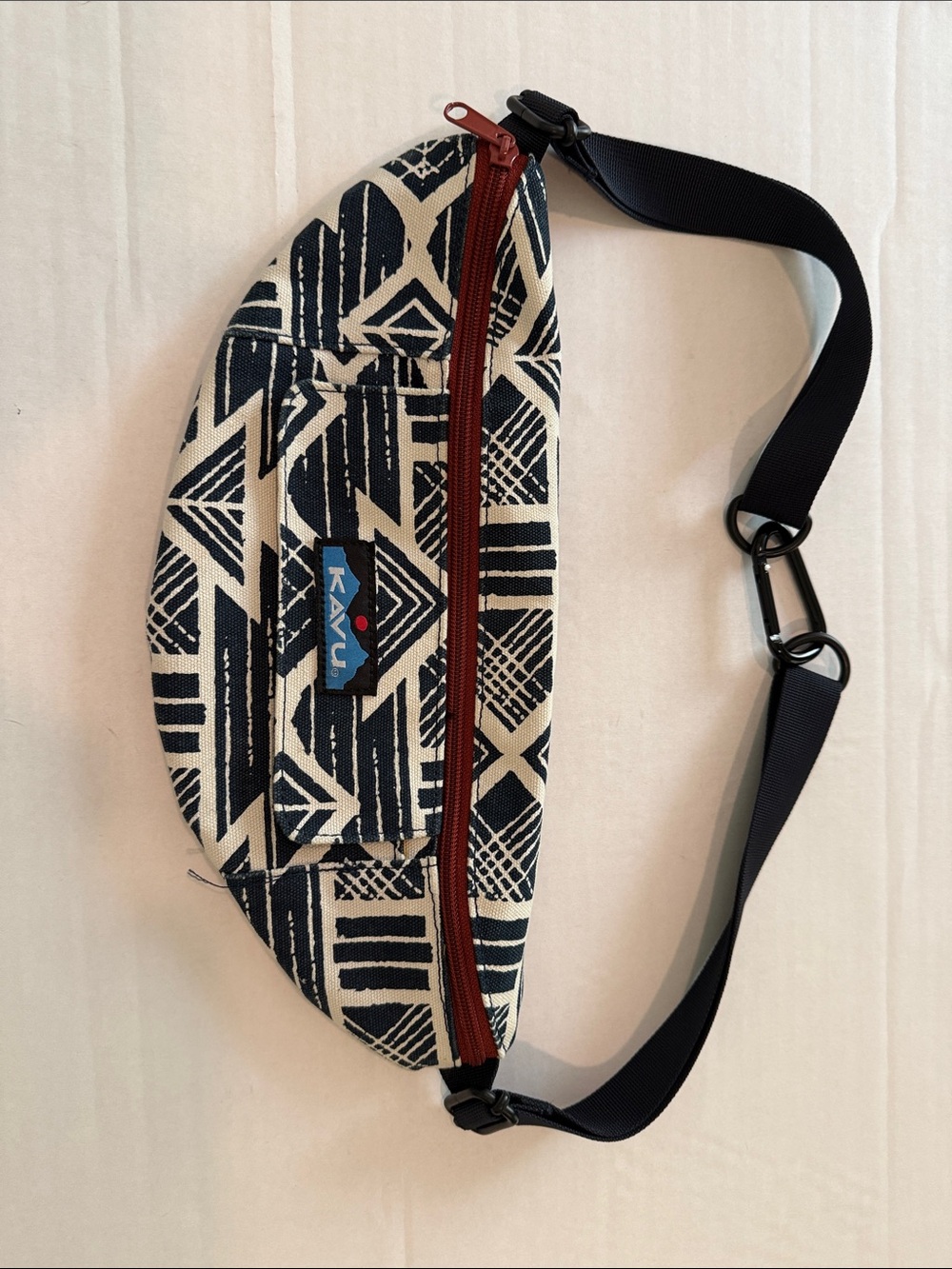 KAVU Stroll Around Belt Bag featuring a geometric desert mosaic pattern.